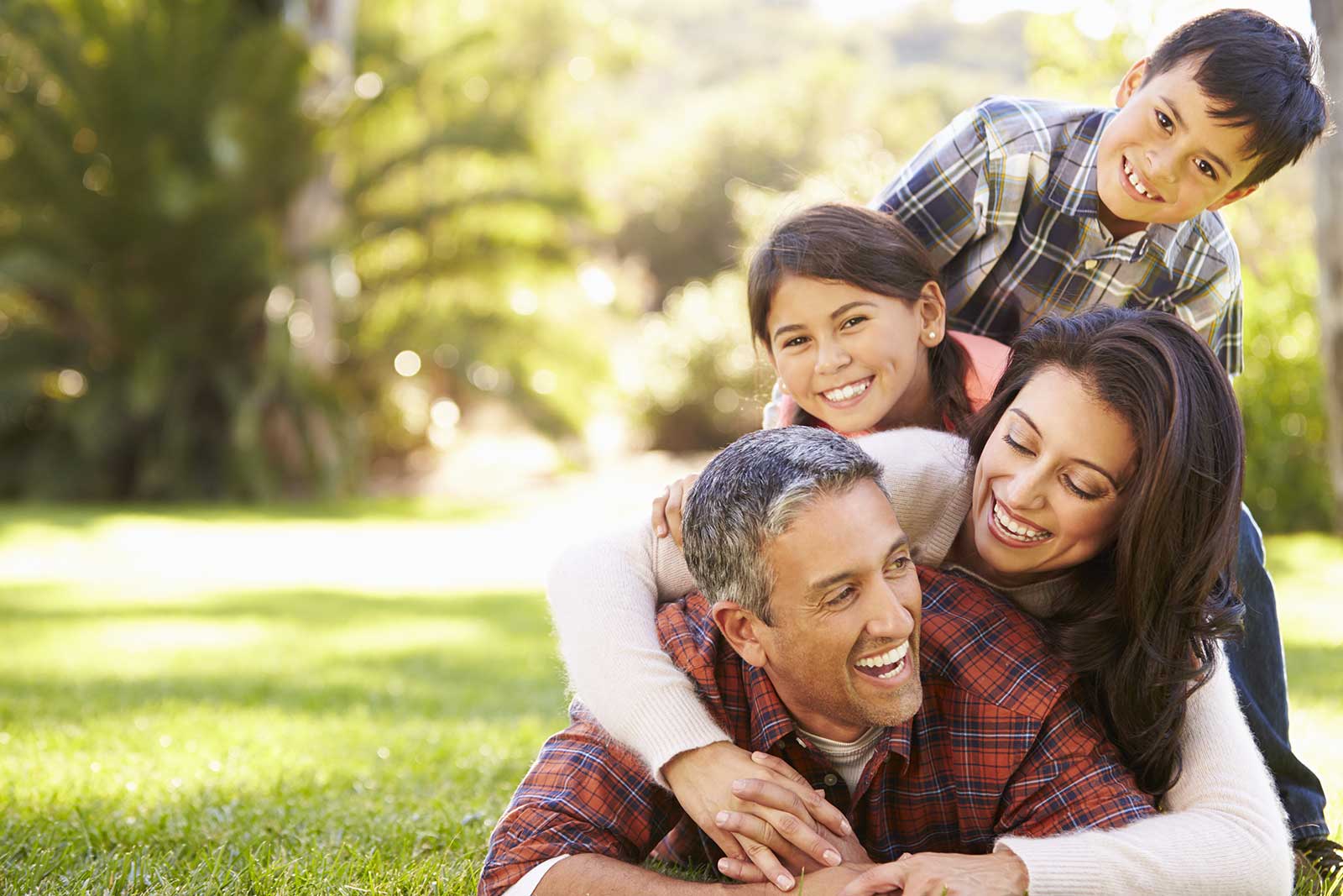 family playing on grass